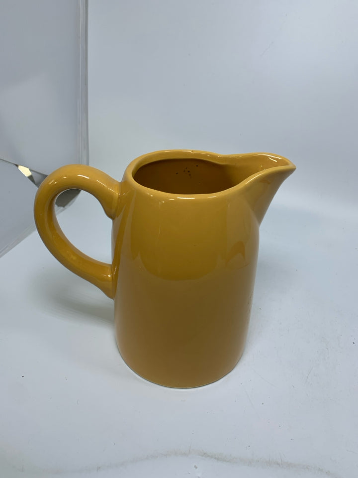 MUSTARD YELLOW PITCHER.