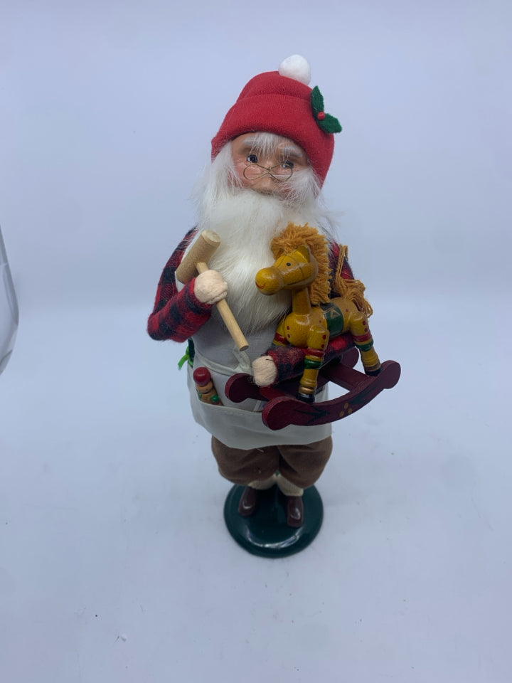 1992 BYERS CHOICE SANTA WORKING ON TOYS.