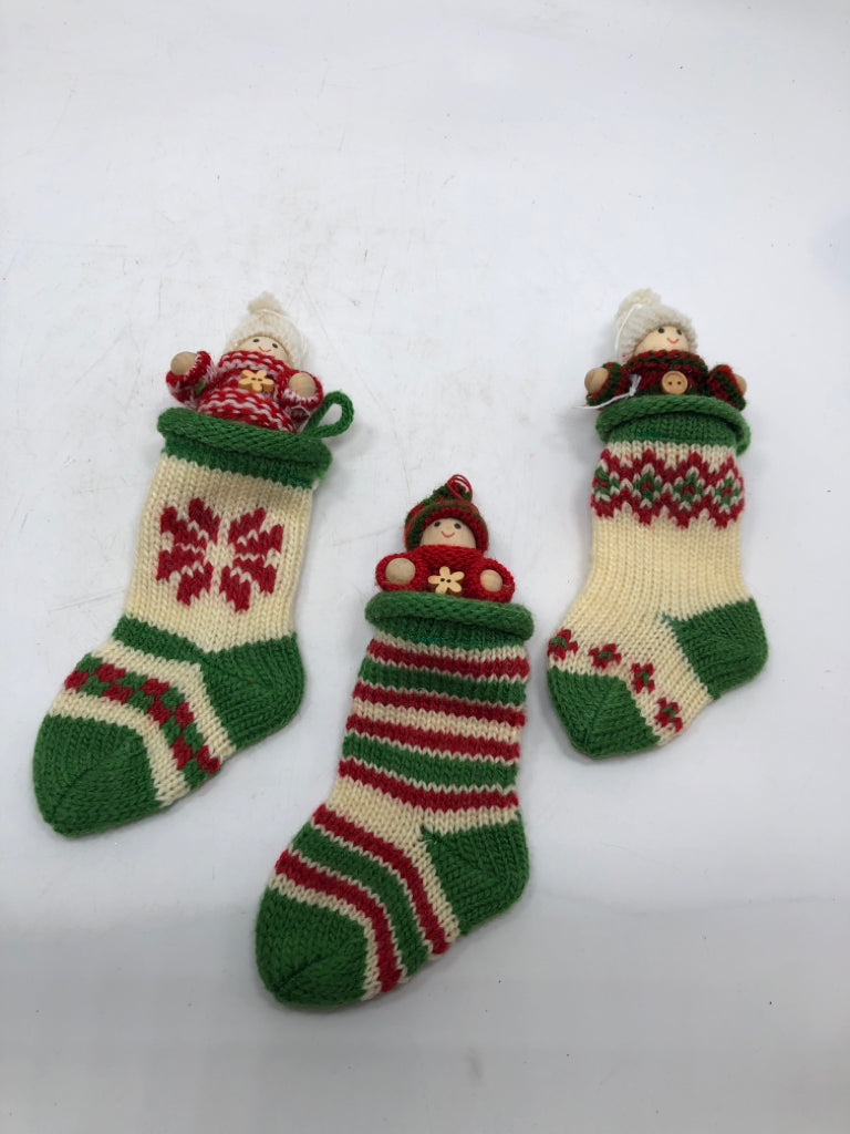 3 STOCKING W/ LITTLE PEOPLE ORNAMENTS IN BAG.