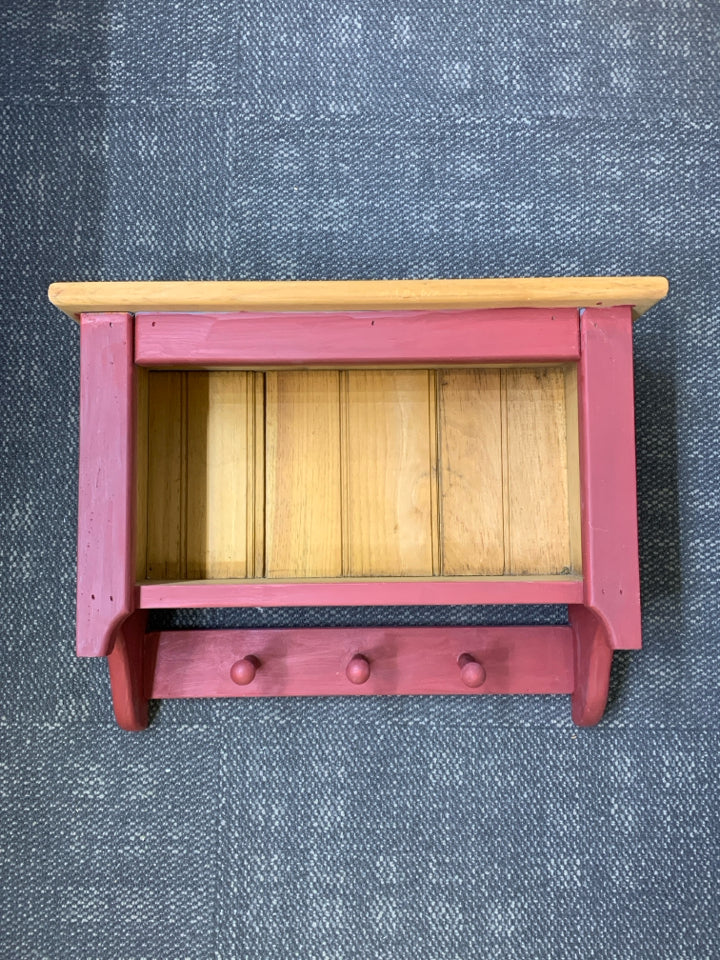 WOOD RED PAINTED SHELF W/ 3 HOOKS.