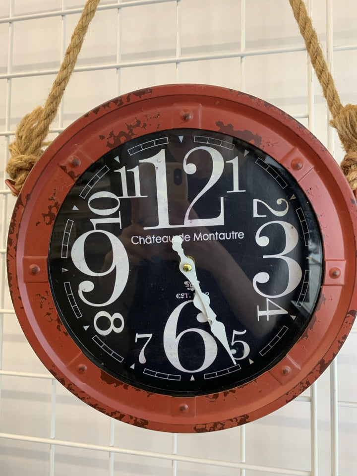 RED METAL INDUSTRIAL HANGING CLOCK.