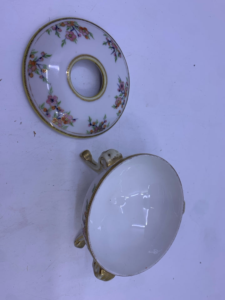 VTG FLORAL FOOTED HAIR CATCH.