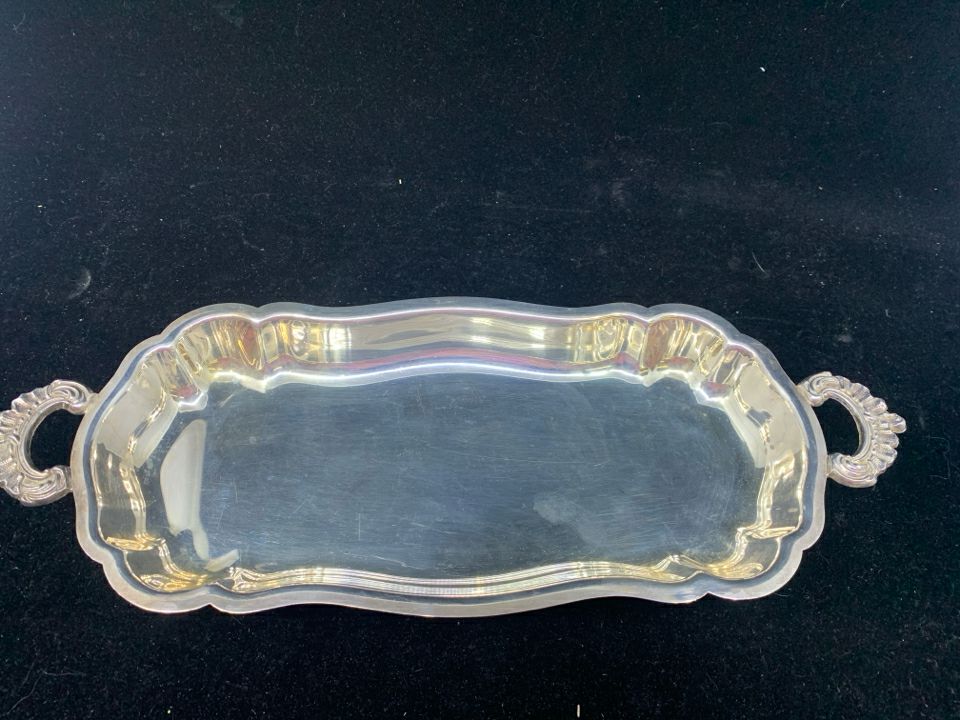 OVAL SILVER FOOTED DISH W HANDLES.