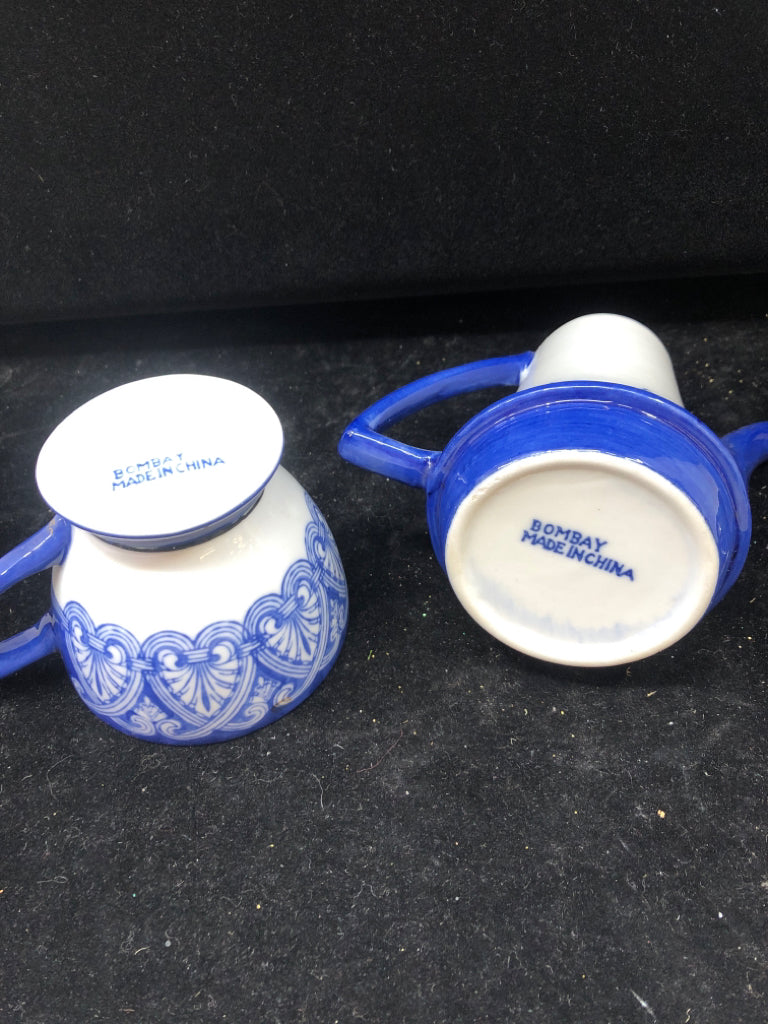 2PC BLUE AND WHITE TEACUP AND TEAPOT.