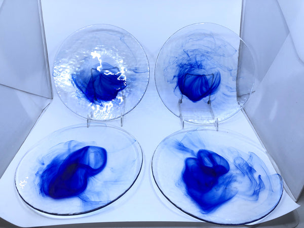 4 COBALT BLUE SWIRLED DINNER PLATES.