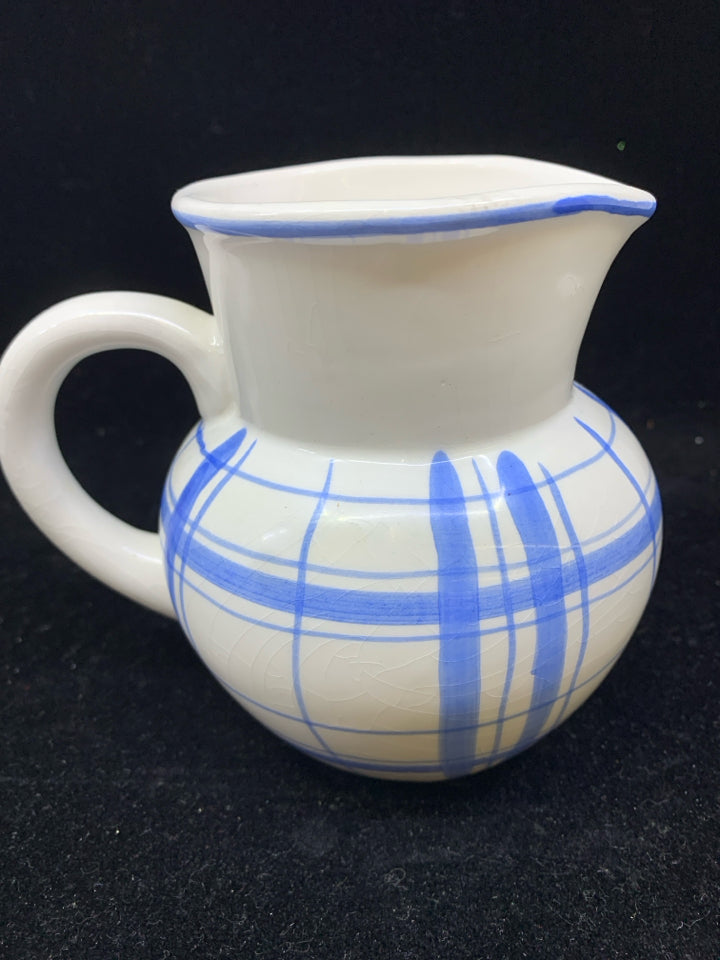 SMALL BLUE AND WHITE PITCHER.