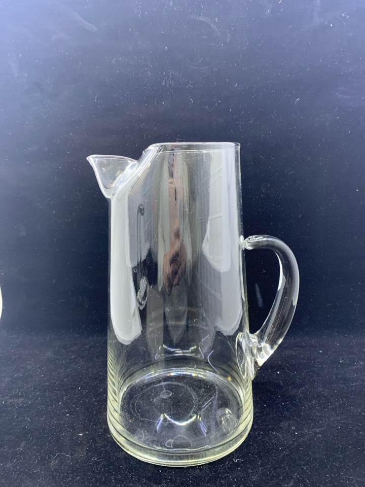 TALL GLASS PITCHER W ICE LIP.