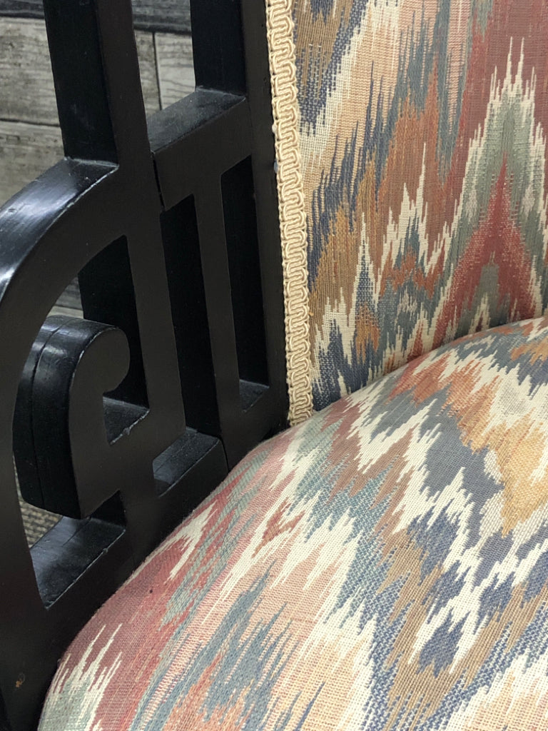 SHORT ROUND PASTEL UPHOLDERED W BLACK WOOD ACCENTS CHAIR.