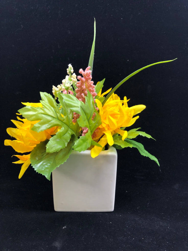 FAUX YELLOW FLORAL IN WHITE VASE.