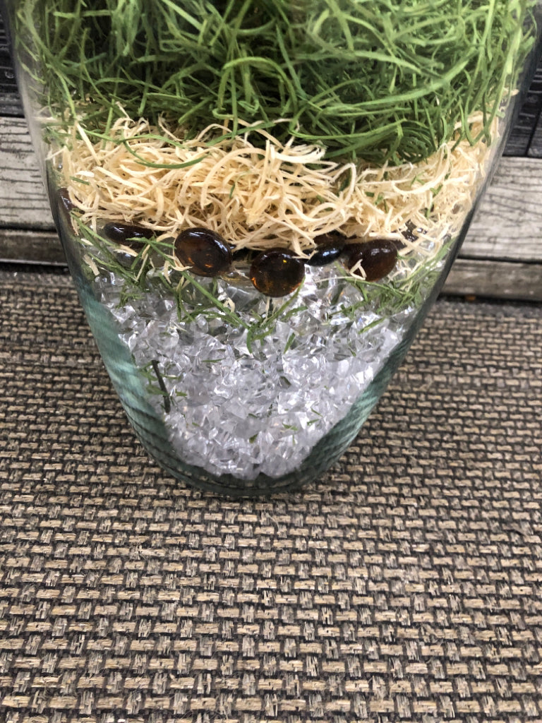 FAUX YELLOW ORCHIDS IN MARBLE FILLED VASE.