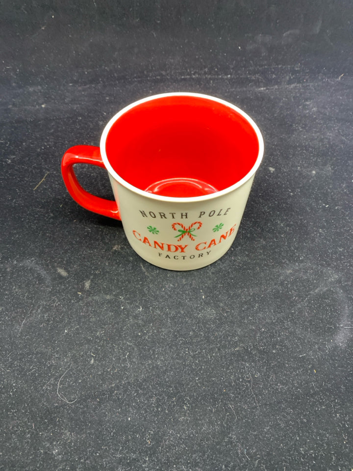 NORTH POLE RED AND WHITE MUG.