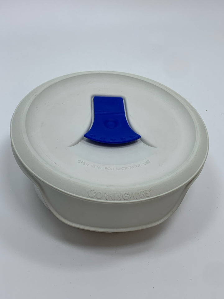 COVERED CORNING WARE DISH.