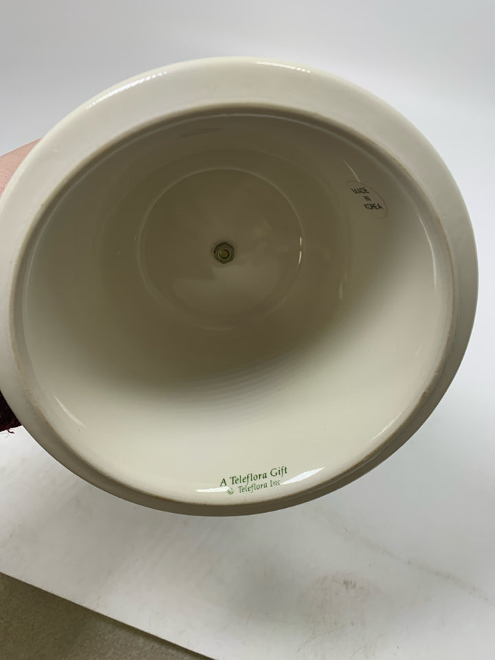 WHITE CERAMIC BASE W/ HOLLY METAL TAPERED CANDLE HOLDER.
