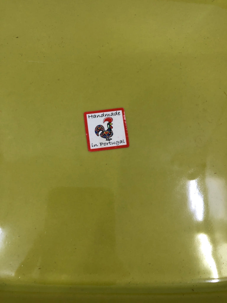 GREEN STONEWARE DISH GRESTEL W/ EMBOSSED LINES ON EDGE.