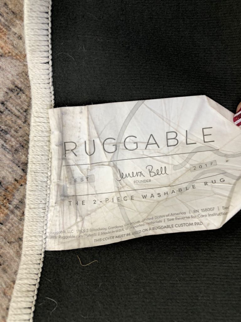DISTRESSED CREAM WASHABLE RUGGABLE RUG.