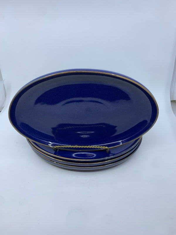 4 OVAL BLUE DINNER PLATES.