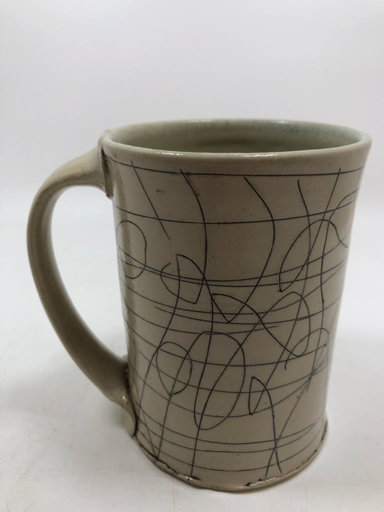 ARTISTS SCRIBBLE CERAMIC MUG.