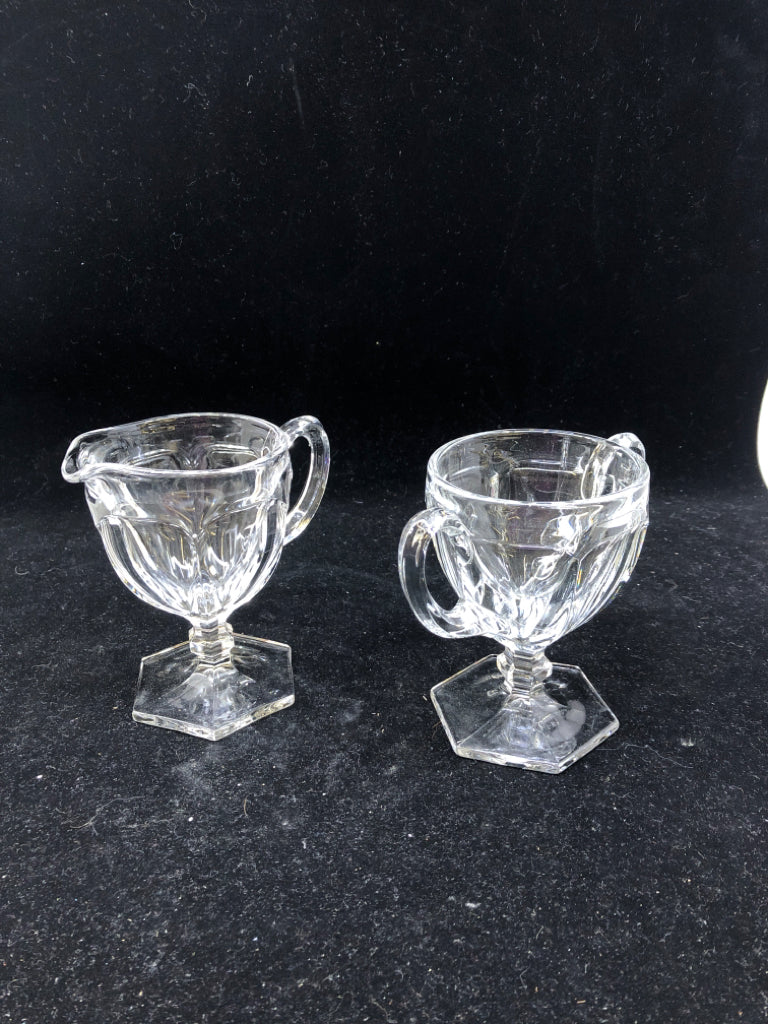2PC GLASS FOOTED SUGAR AND CREAMER SET.