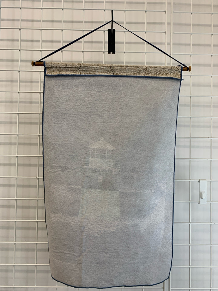 LIGHTHOUSE THEMED HANGING TAPESTRY ON BEIGE MAP.