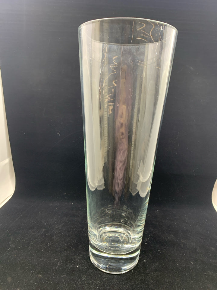 HEAVY BOTTOM TALL THICK GLASS VASE.