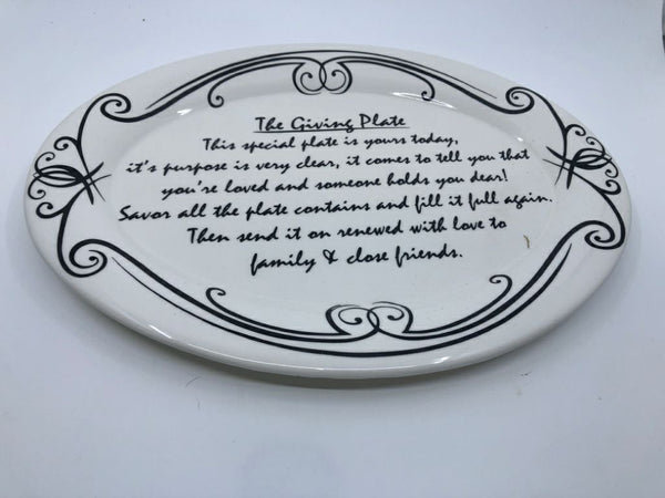 BLACK AND WHITE OVAL THE GIVING PLATE.