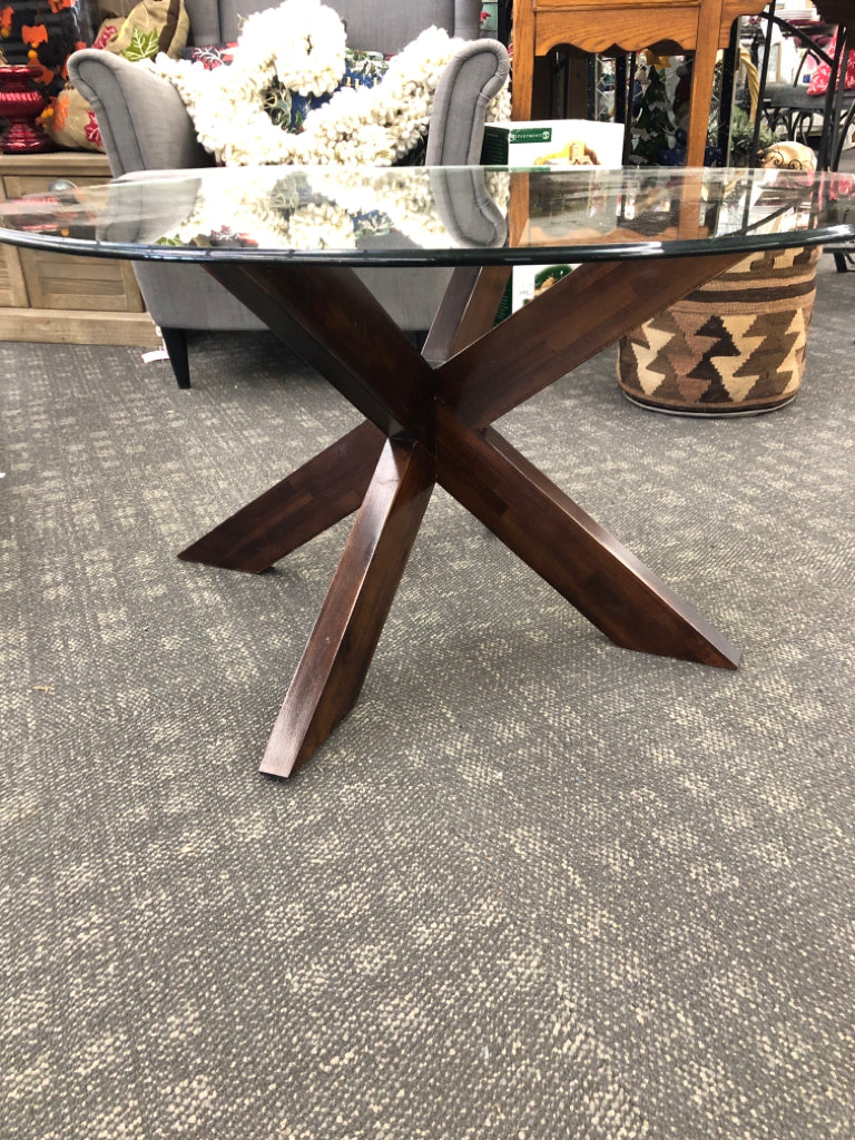 CIRCLE LOW GLASS COFFEE TABLE W/ DARK BASE.