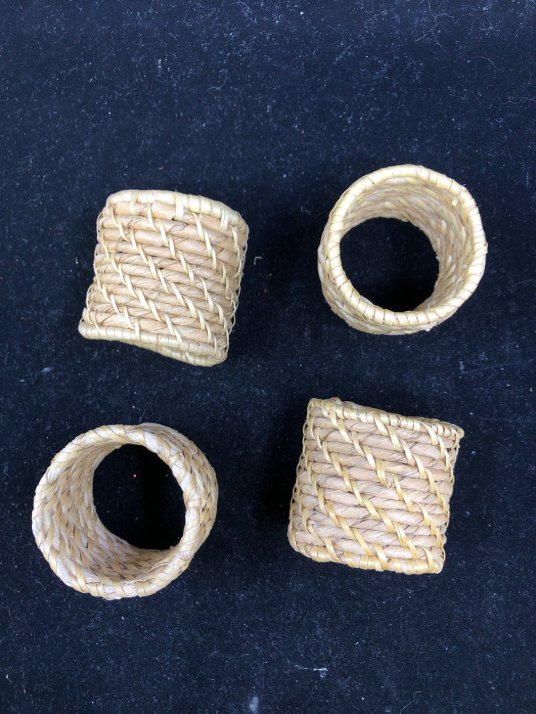 4 WICKER NAPKIN RINGS.