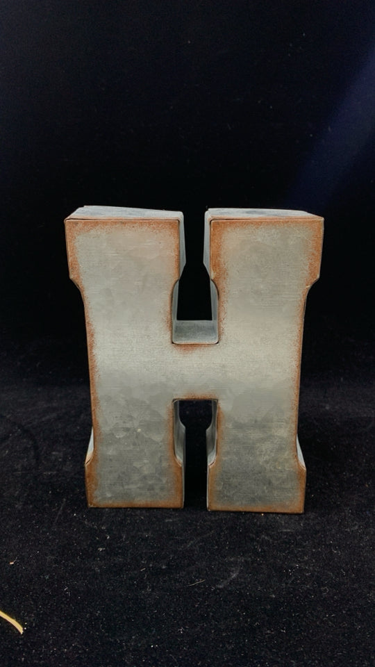 METAL "H".