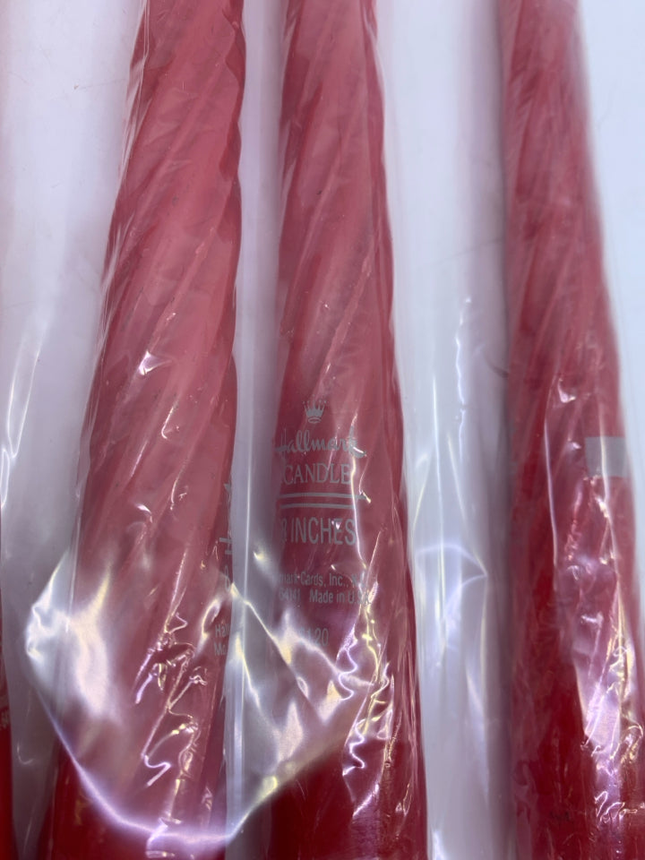 4 NEW HALLMARK TAPER CANDLES.