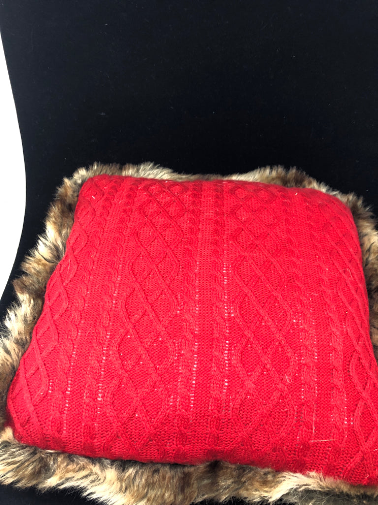RED SWEATER PILLOW W/ FAUX FUR EDGE.