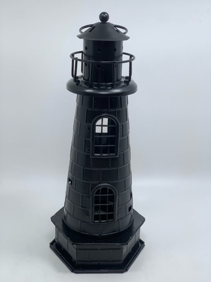 BLACK METAL LIGHTHOUSE TEA LIGHT HOLDER.