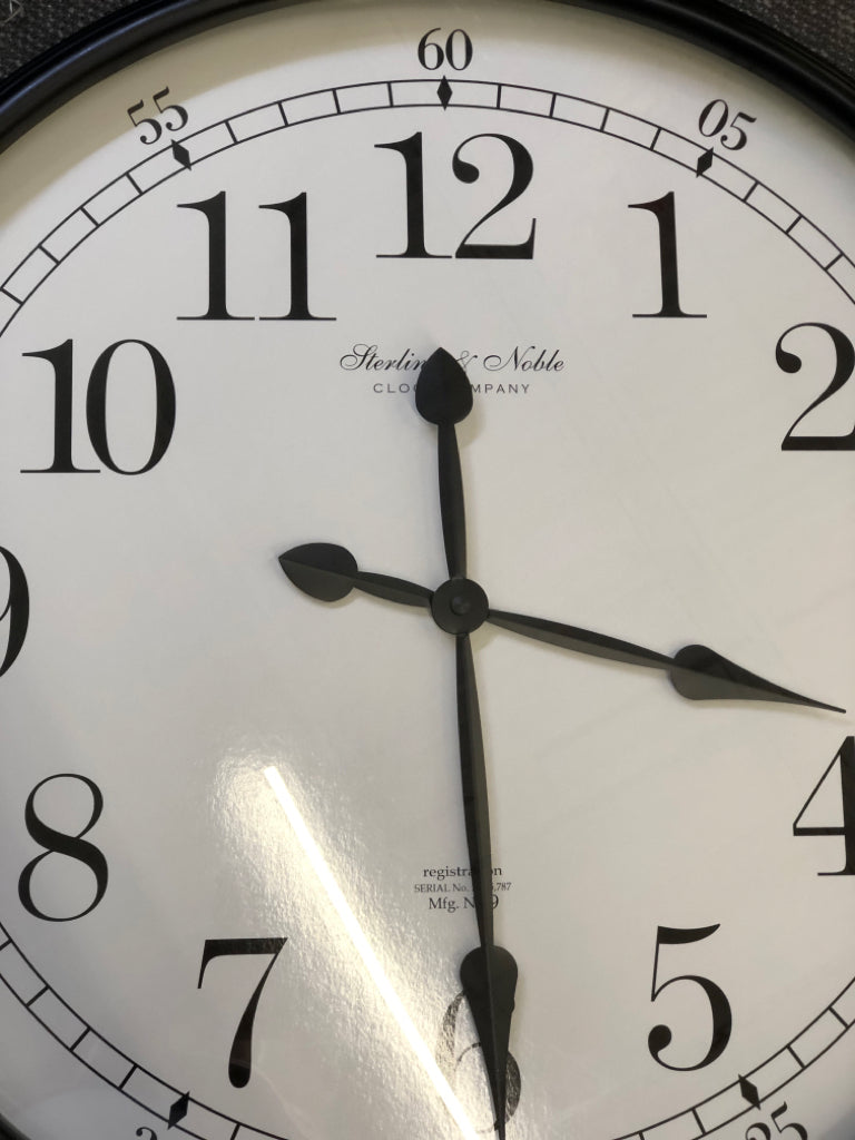 LARGE ROUND WALL CLOCK- BLACK FRAME.