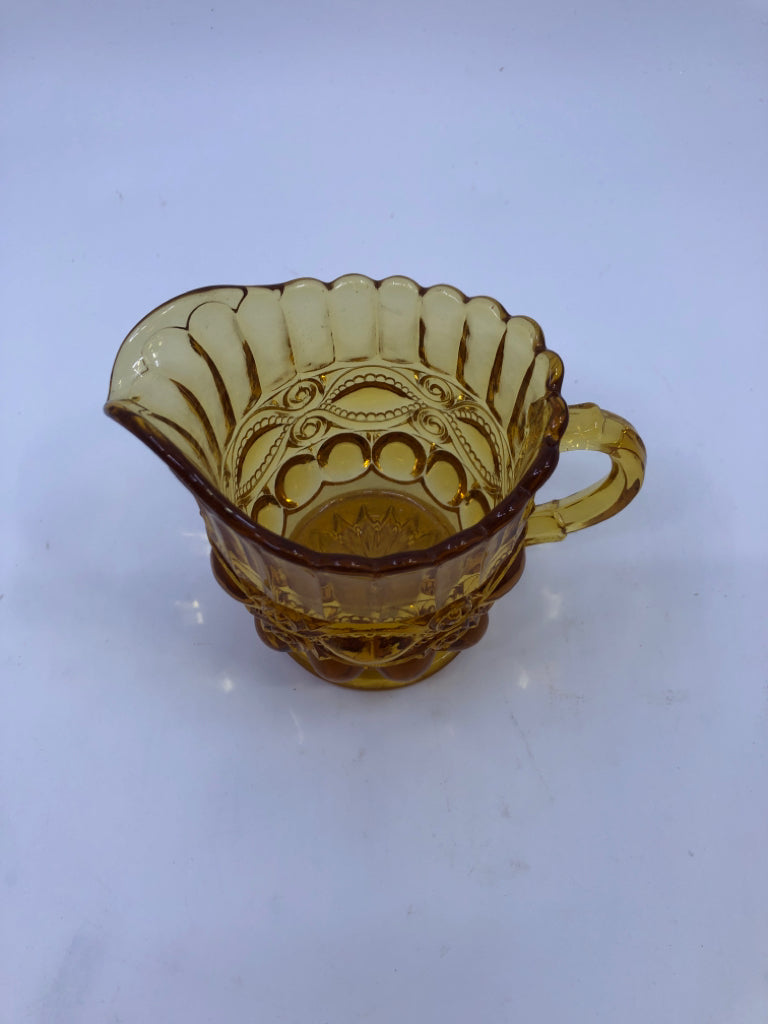 VTG AMBER GLASS CREAMER.