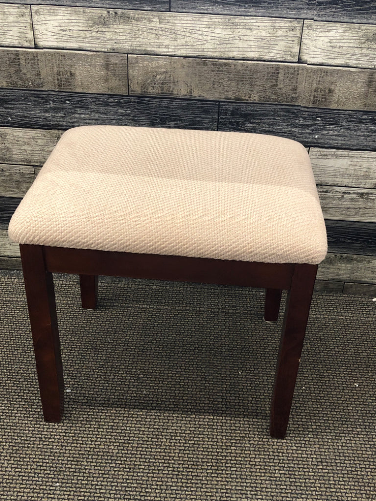 DARK WOOD LEG OTTOMAN/ STOOL W TAN CUSHION.