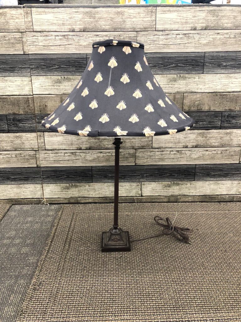 SKINNY BASE LAMP W LARGE BLACK SHADE W BUGS.