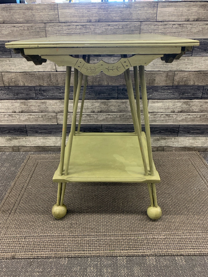 2 TIER VTG GREEN PAINTED WOOD TABLE ABSTRACT DESIGN.