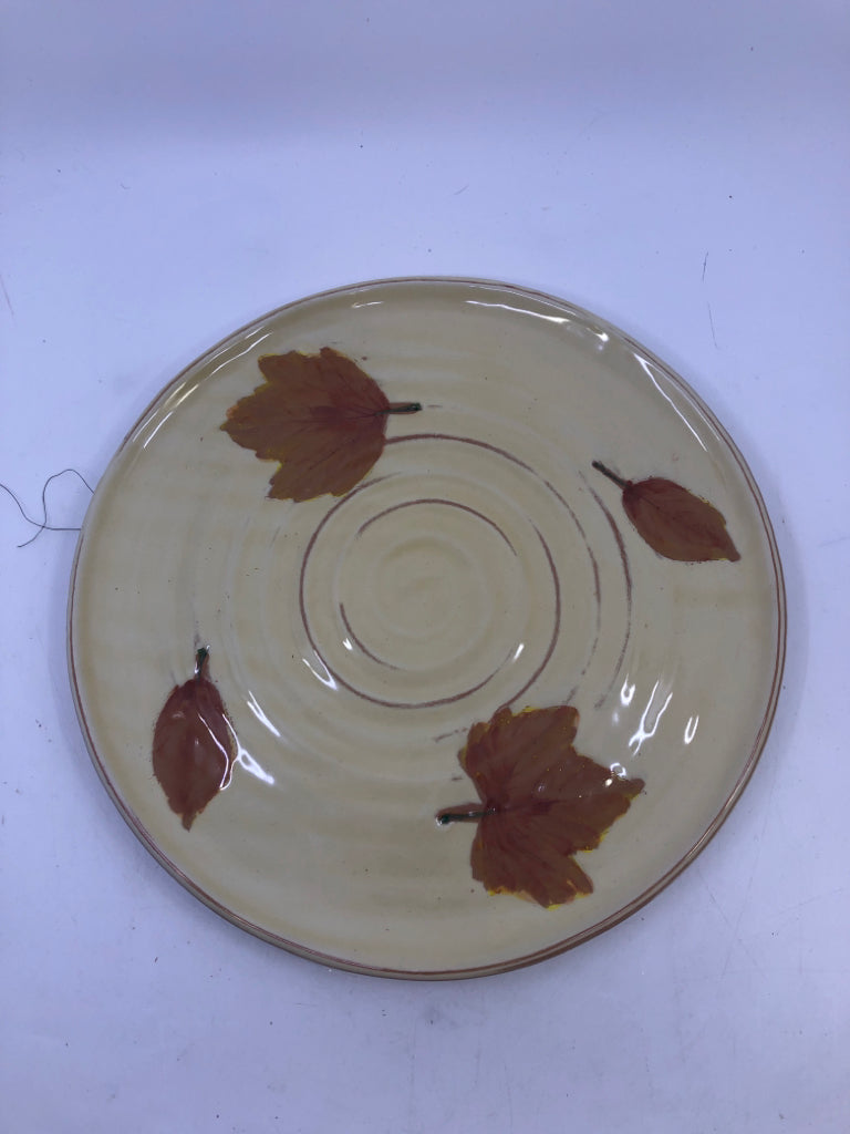 YELLOW ROUND SERVER W LEAVES.