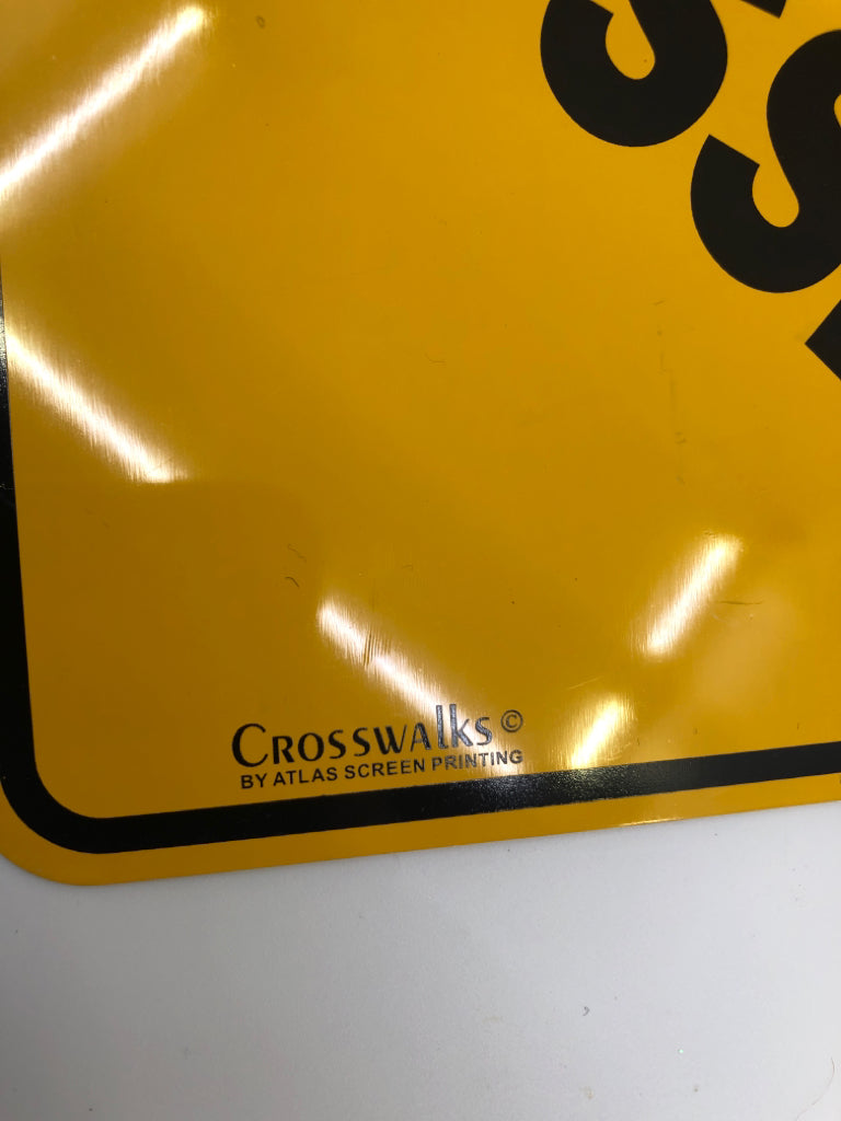 METAL SKATEBOARD CROSSING SIGN.
