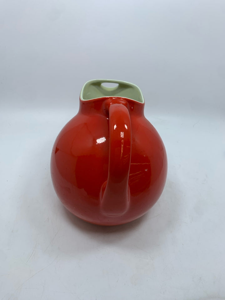 VTG RED CERAMIC PITCHER WITH ICE LIP.