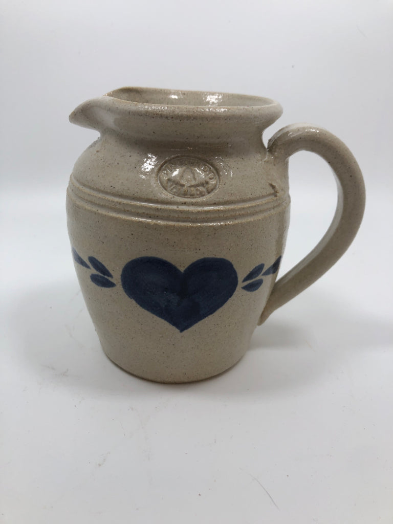 BEIGE PITCHER W/ BLUE HEART STONEWARE.