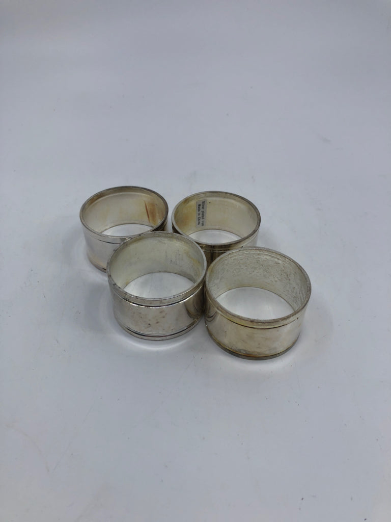 4 SILVER PLATED IRON NAPKIN RINGS.