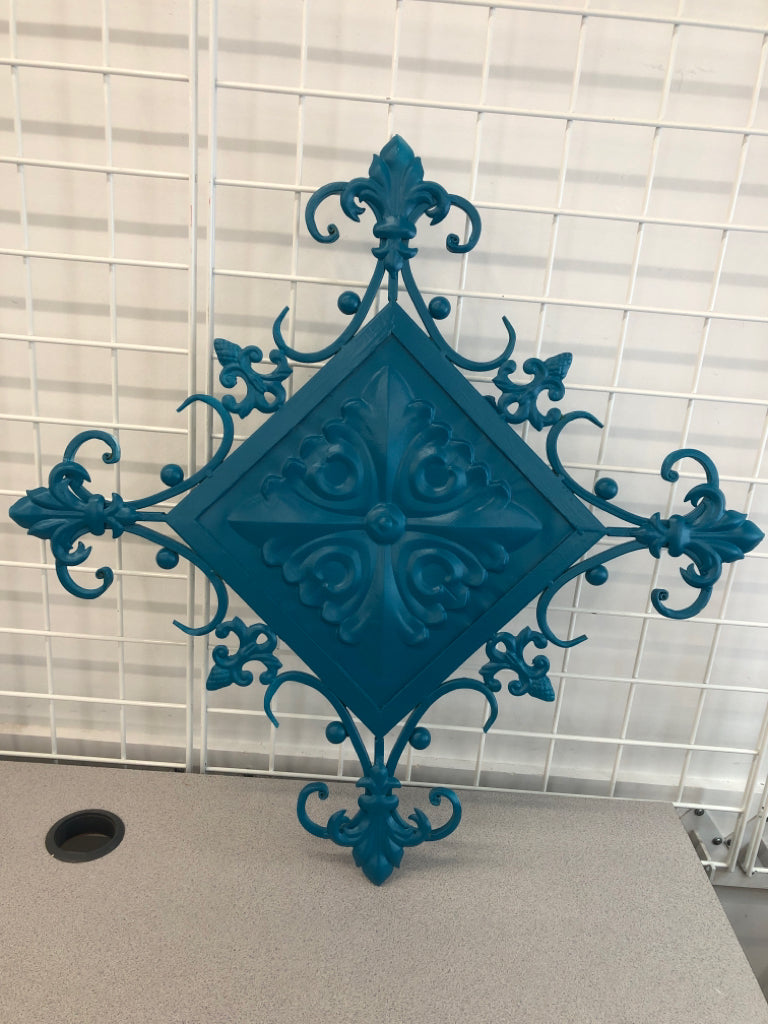 TEAL METAL WALL DECOR.