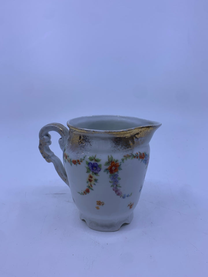 VTG THIN PORCELAIN FLORAL CREAMER.