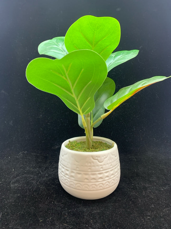 FAUX LEAVES IN EMBOSSED PLANTER.