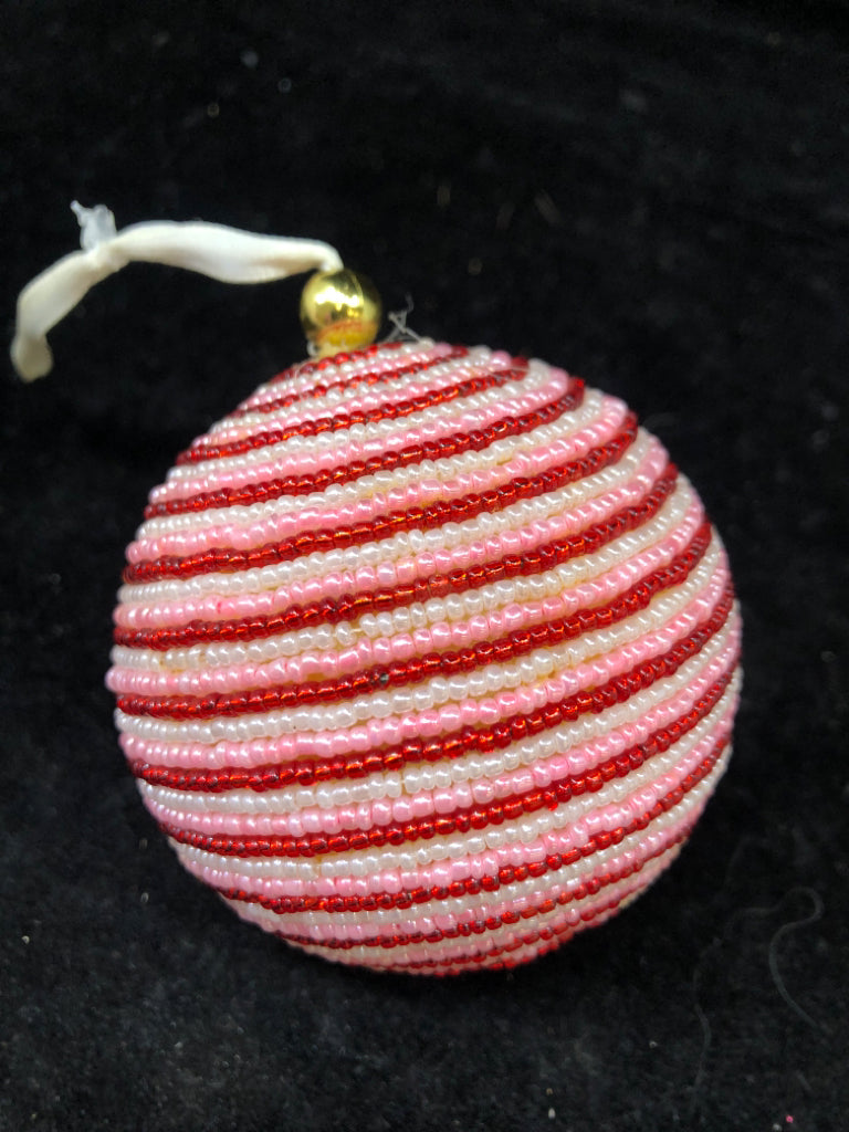 RED/PINK/WHITE STRIPE BEADED ORNAMENT.
