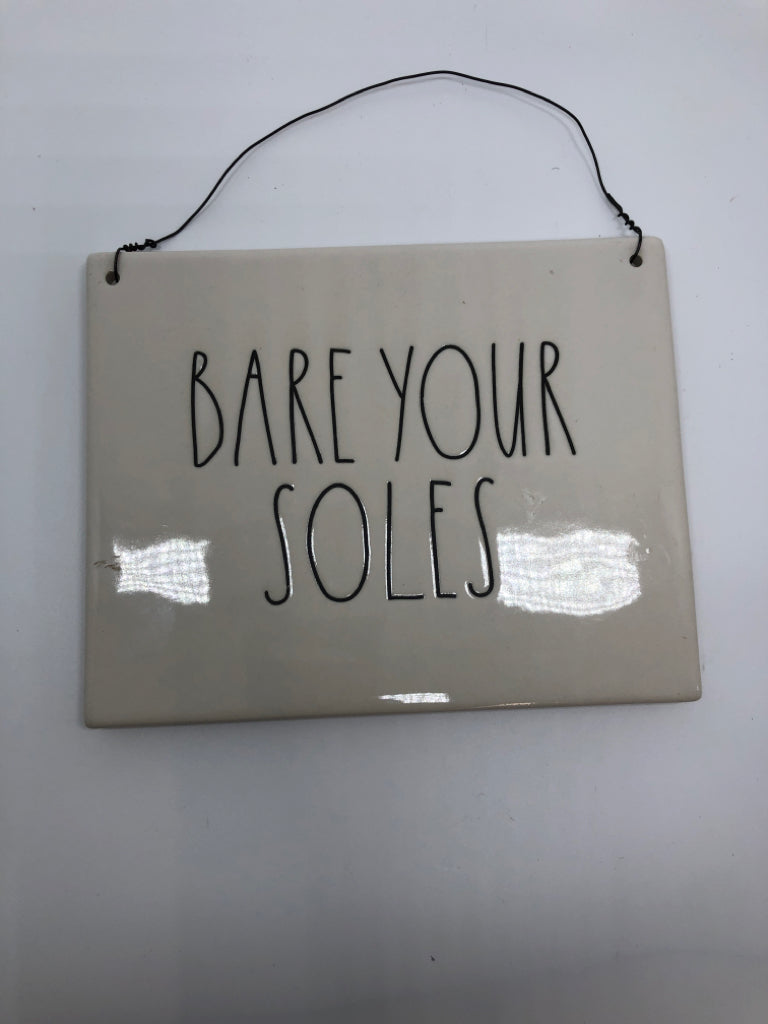 RAE DUNN BARE YOUR SOLES CERAMIC WALL HANGING.