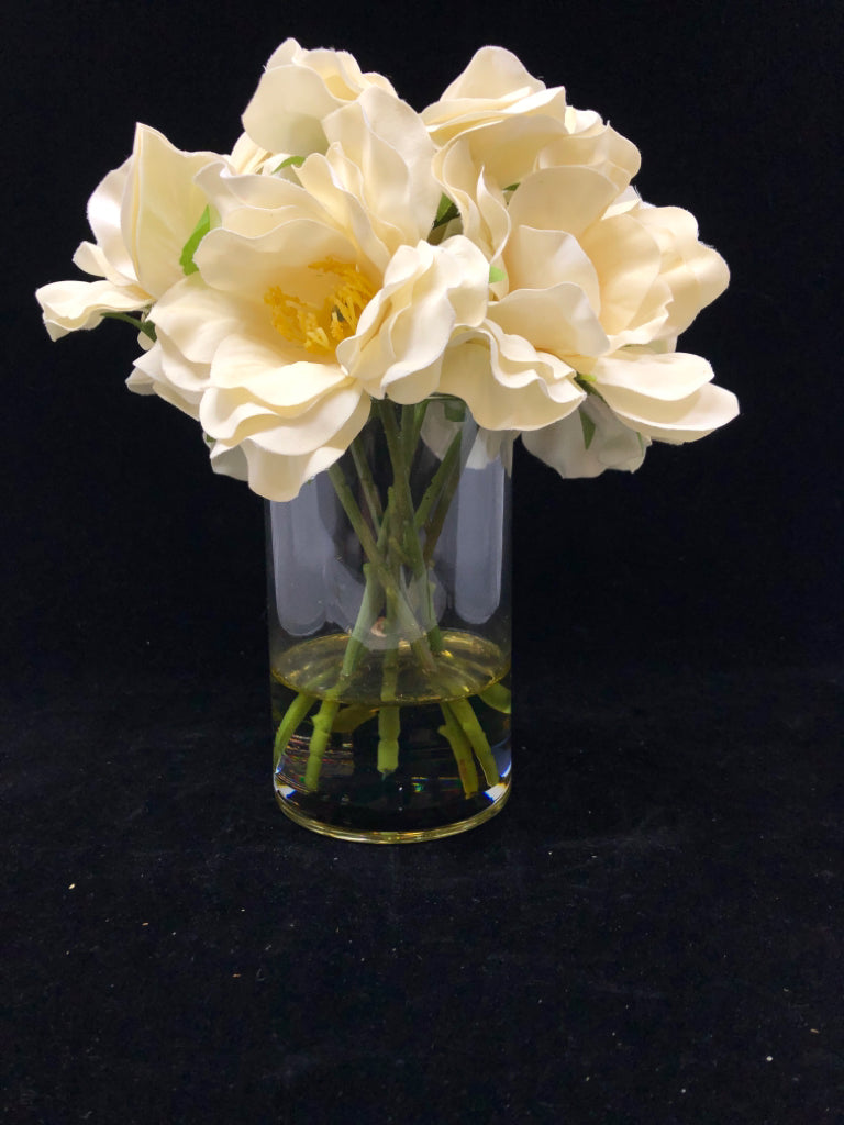 FAUX WHITE FLOWERS IN GLASS VASE.