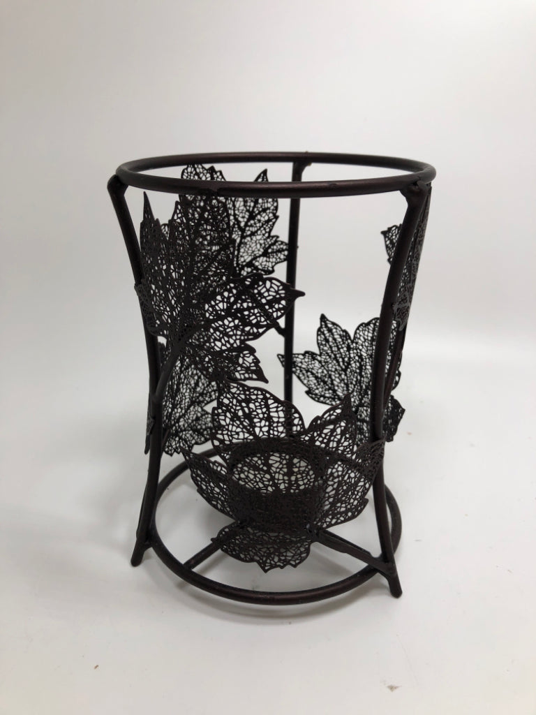 METAL LEAF CANDLE HOLDER.