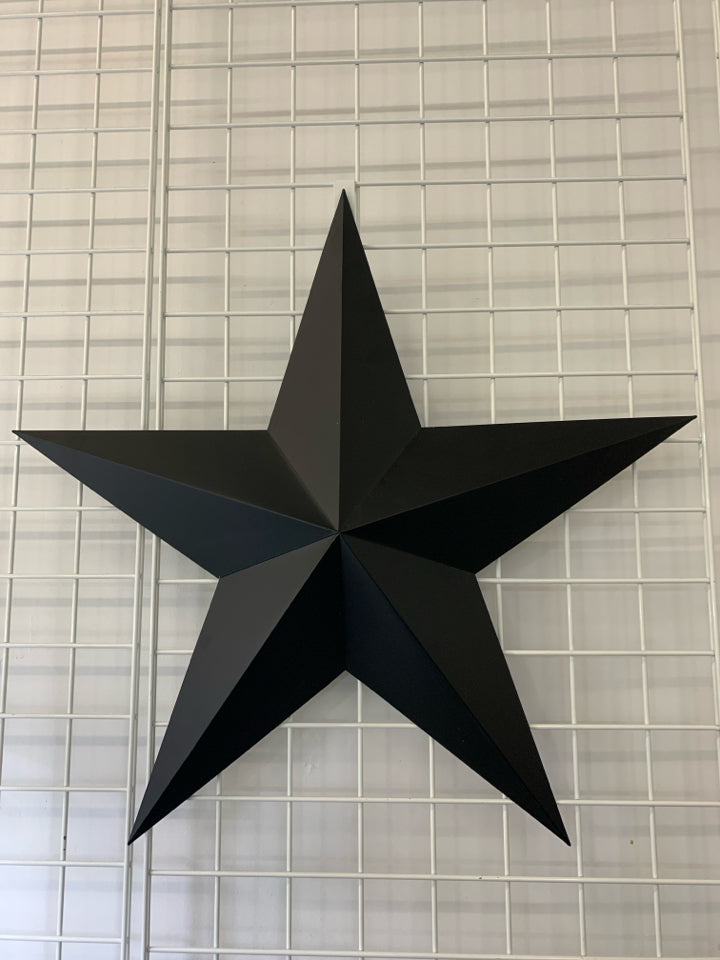 LARGE BLACK METAL 3D STAR WALL ART.