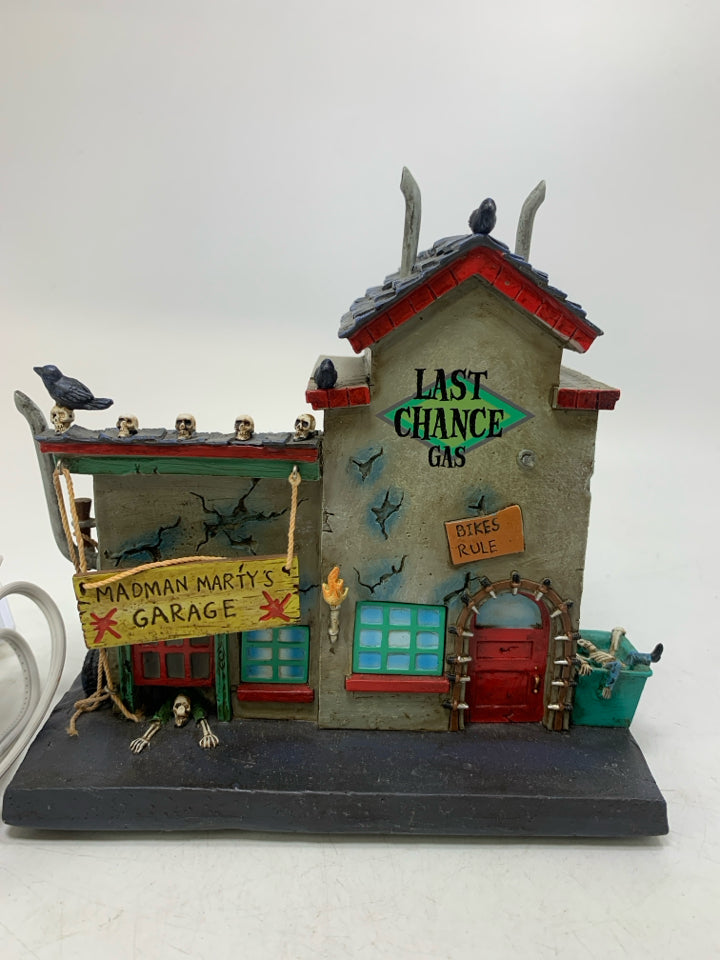 HAWTHORNE VILLAGE MADMAN MARTY'S GARAGE & GAS RETIRED #A1751